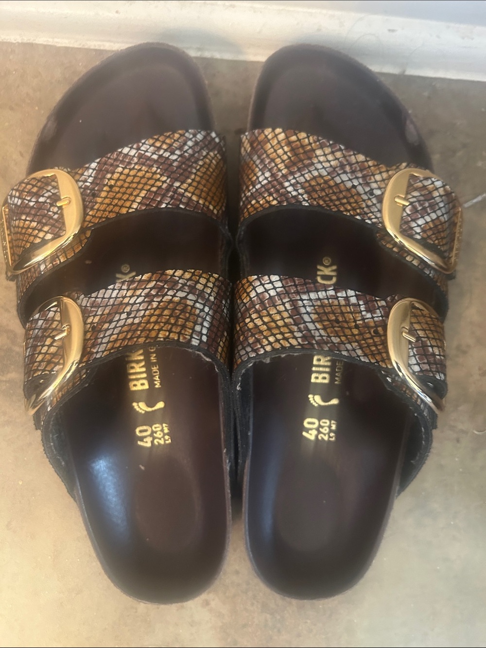 Birkenstock Arizona Snake-Print Sandals in Brown and Gold